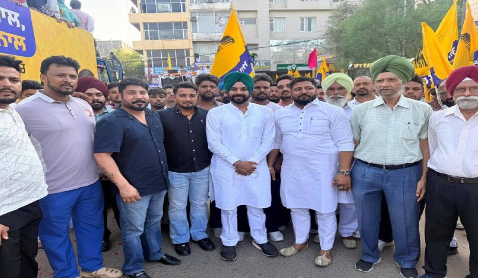 Mayor Sarabjeet Singh Samana greets residents during the Thanksgiving Road Show in SAS Nagar Mohali.