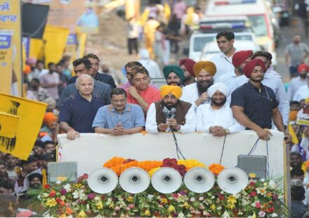 Chief Minister Bhagwant Mann, Arvind Kejriwal and MLA Kulwant Singh during the Thanksgiving Road Show in Mohali attended by a large gathering of residents.