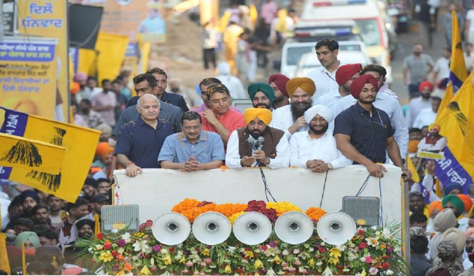 Chief Minister Bhagwant Mann, Arvind Kejriwal and MLA Kulwant Singh during the Thanksgiving Road Show in Mohali attended by a large gathering of residents.
