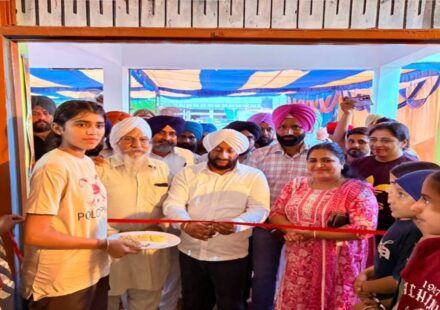 MLA Kulwant Singh inaugurating a new village gym during a Lok Milni programme in Gudana village, SAS Nagar Mohali, with local residents.