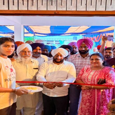MLA Kulwant Singh inaugurating a new village gym during a Lok Milni programme in Gudana village, SAS Nagar Mohali, with local residents.