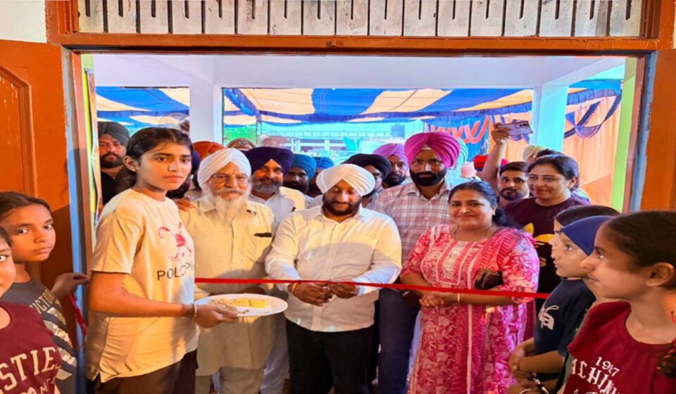 MLA Kulwant Singh inaugurating a new village gym during a Lok Milni programme in Gudana village, SAS Nagar Mohali, with local residents.
