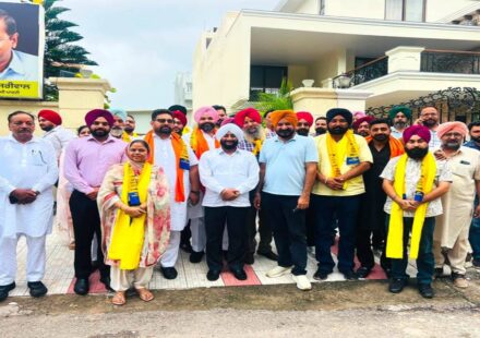 MLA Kulwant Singh welcomes Harjit Singh Bholu and supporters into the Aam Aadmi Party in Mohali.
