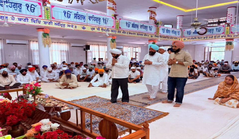 MLA Kulwant Singh attends the funeral of young Amritpal Singh in Mataur village, Mohali