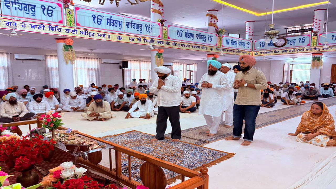 MLA Kulwant Singh attends the funeral of young Amritpal Singh in Mataur village, Mohali