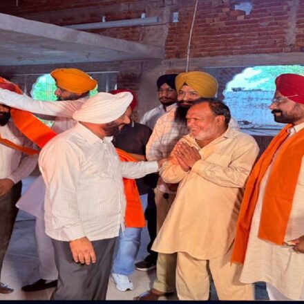 MLA Kulwant Singh interacts with villagers during a Lok Milani programme at Alipur village in Mohali.