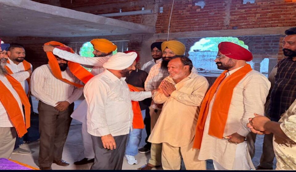 MLA Kulwant Singh interacts with villagers during a Lok Milani programme at Alipur village in Mohali.