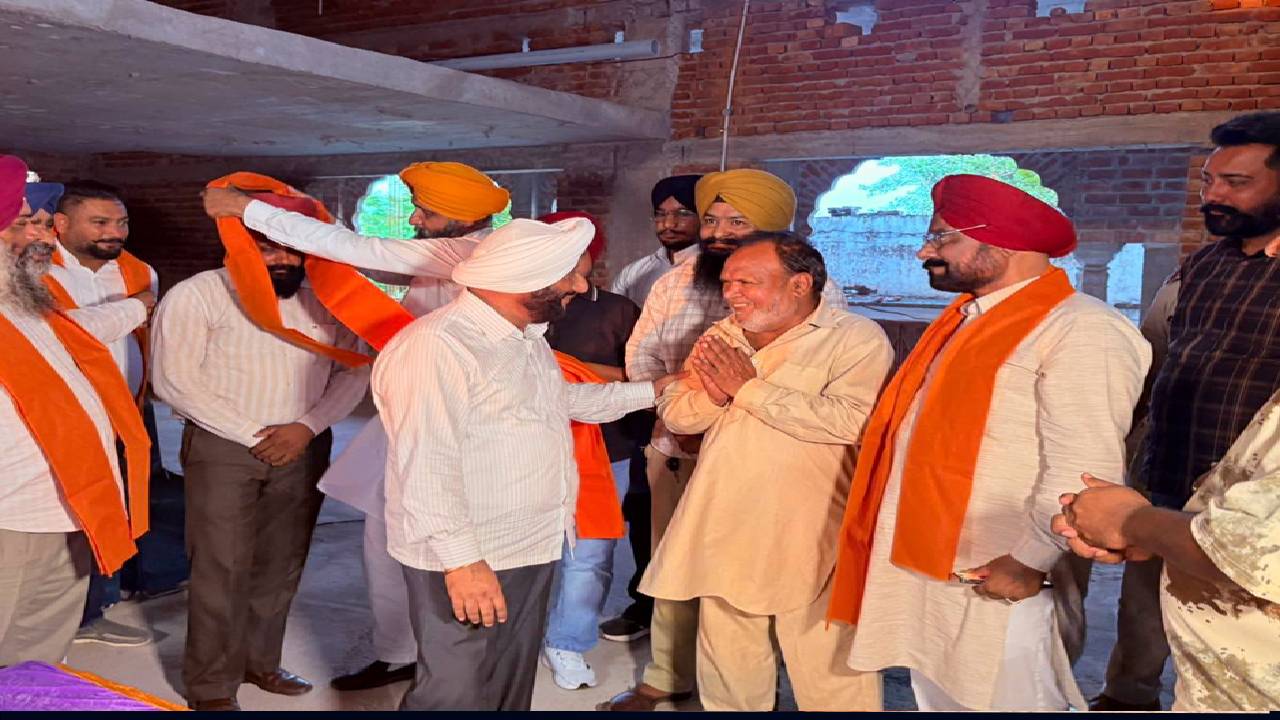 MLA Kulwant Singh interacts with villagers during a Lok Milani programme at Alipur village in Mohali.