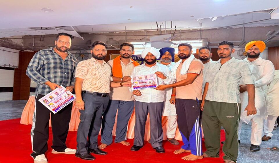 MLA Kulwant Singh interacts with villagers during a Lok Milani programme at Jhurhedi village in Mohali.