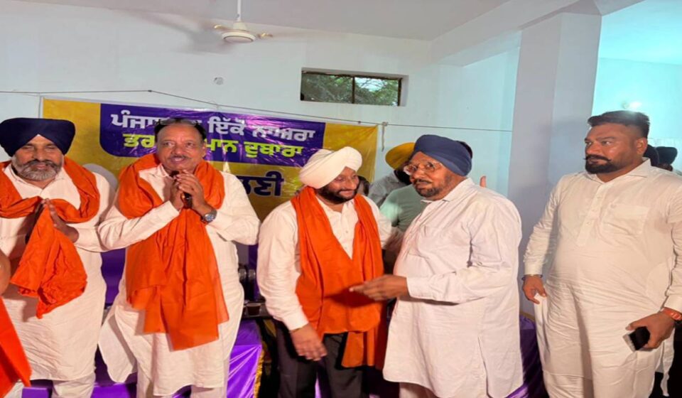 MLA Kulwant Singh interacts with villagers during a Lok Milani programme at Nandiali village in Mohali