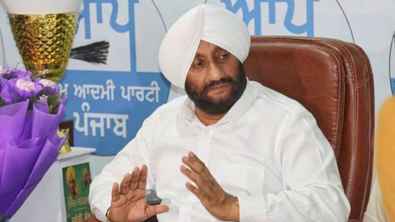 MLA Kulwant Singh addressing journalists during a press interaction in Mohali on employee welfare and development issues.