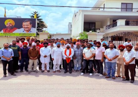 MLA Kulwant Singh interacting with residents during a public grievance meeting at his constituency office in Mohali.