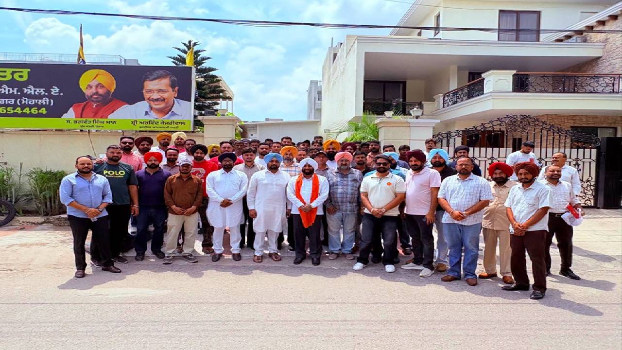 MLA Kulwant Singh interacting with residents during a public grievance meeting at his constituency office in Mohali.