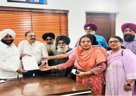MLA Kulwant Singh interacting with residents during a public grievance meeting at his constituency office in Mohali