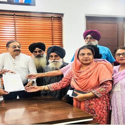 MLA Kulwant Singh interacting with residents during a public grievance meeting at his constituency office in Mohali