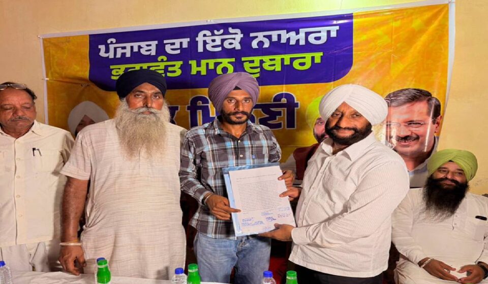 MLA Kulwant Singh interacts with villagers during a public meeting at Maujpur village in Mohali.
