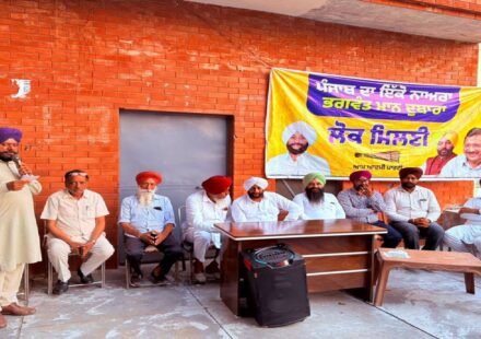 MLA Kulwant Singh interacts with villagers during a public meeting at Raipur Kalan in Mohali.