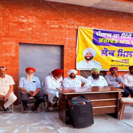 MLA Kulwant Singh interacts with villagers during a public meeting at Raipur Kalan in Mohali.